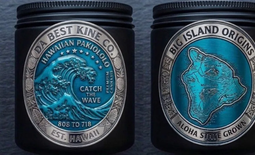 Two Da Best Kine tins with Hawaiian wave and island emblems